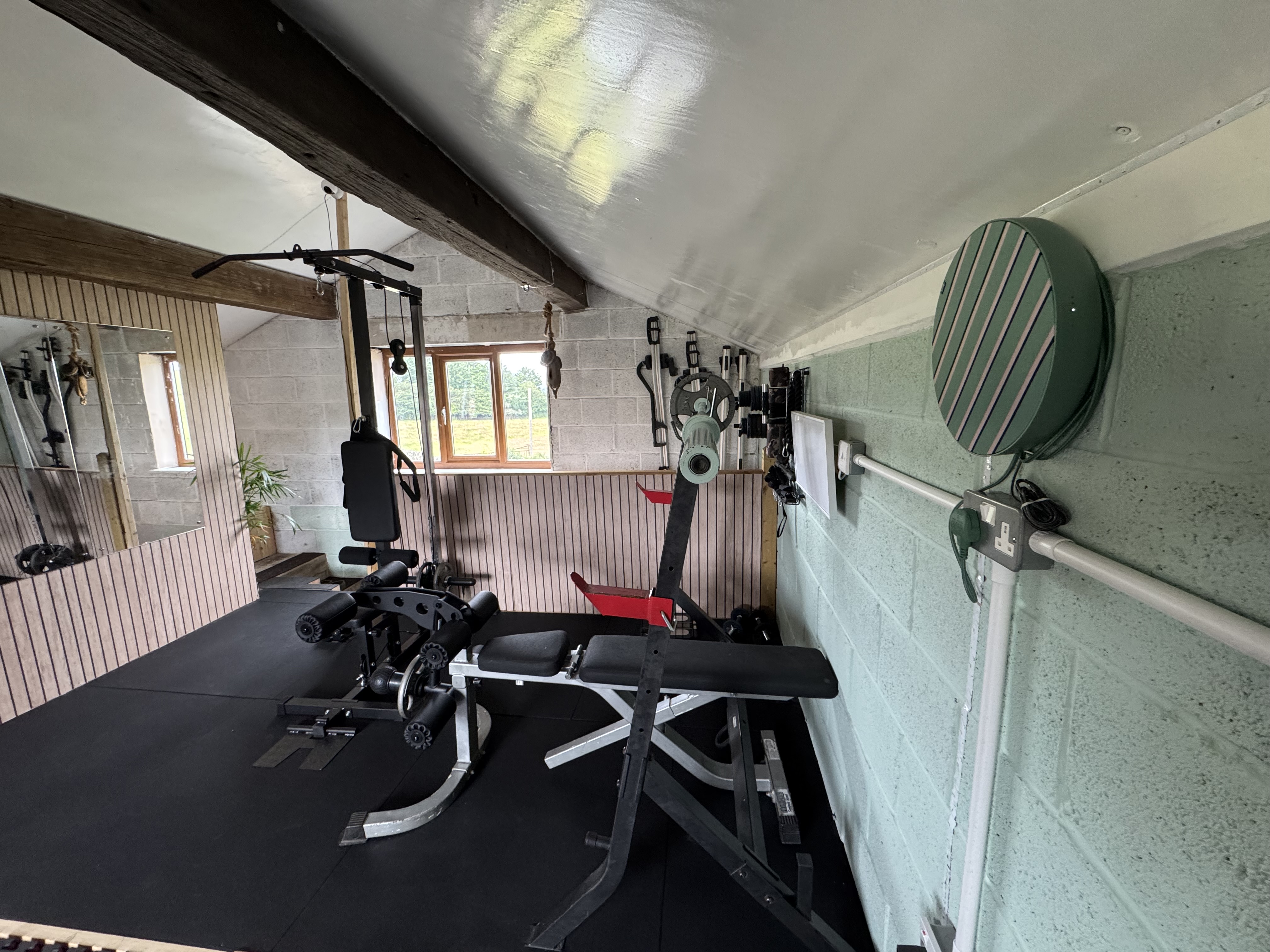 A training setup with music headphones in a gym.